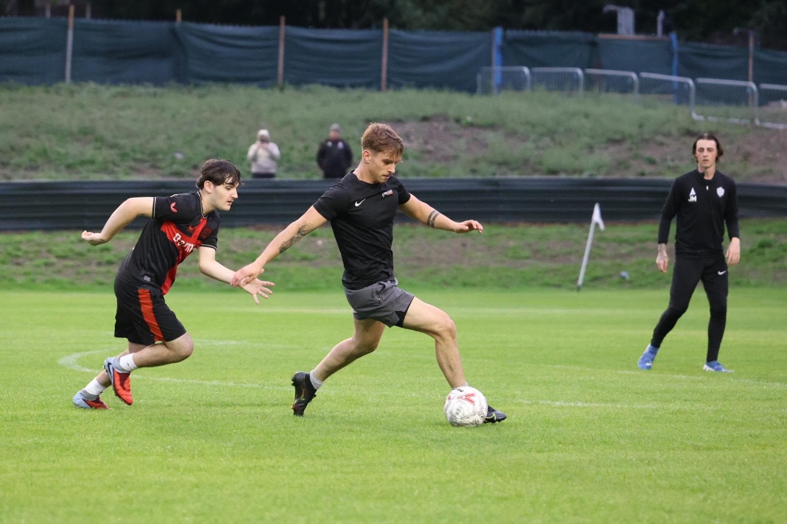 Field Olympic players in a training match at Olympic Park